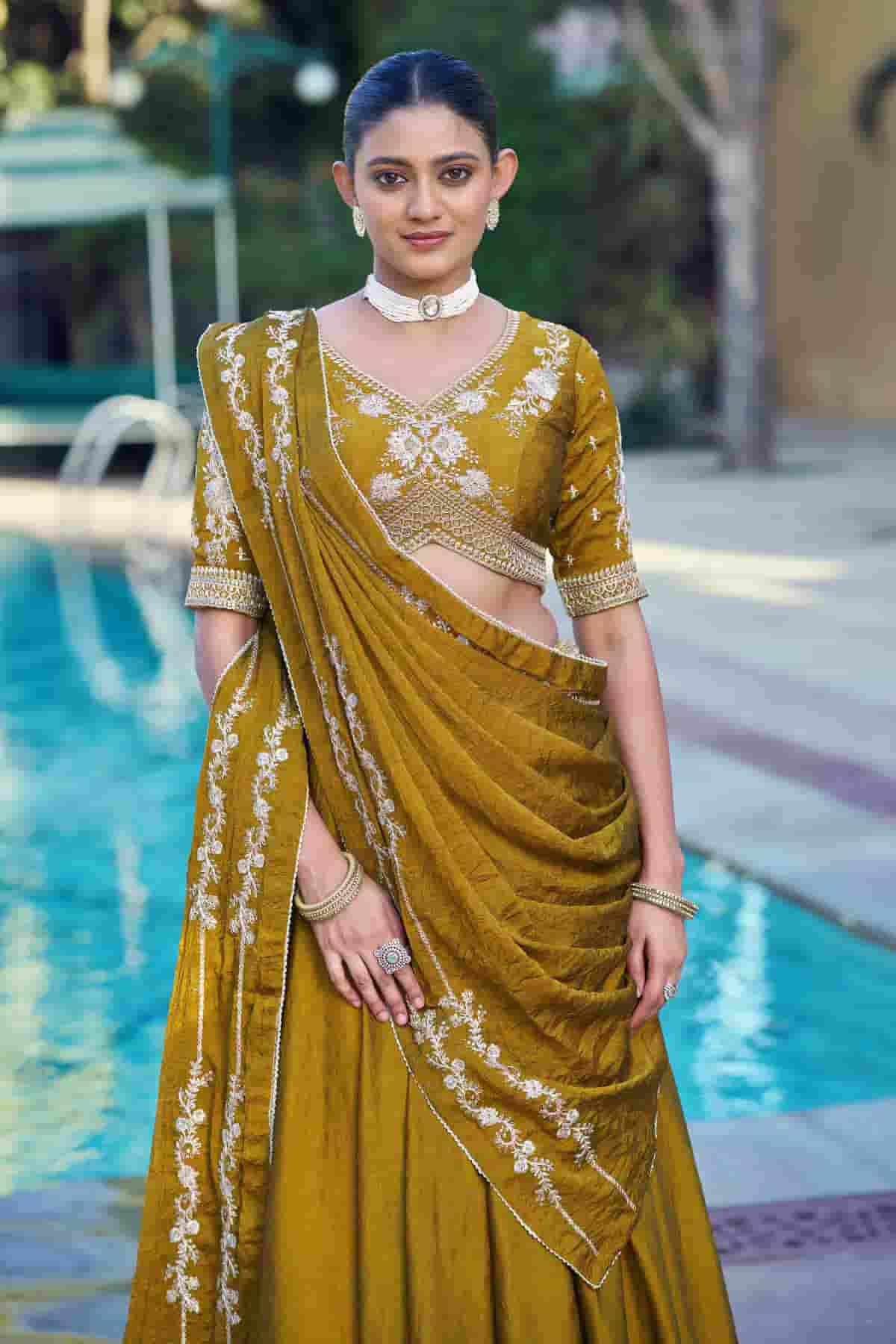 Rangoli Crush Embroidery Sequins Work Lehenga Choli In Mustard Colour NCLD1300034