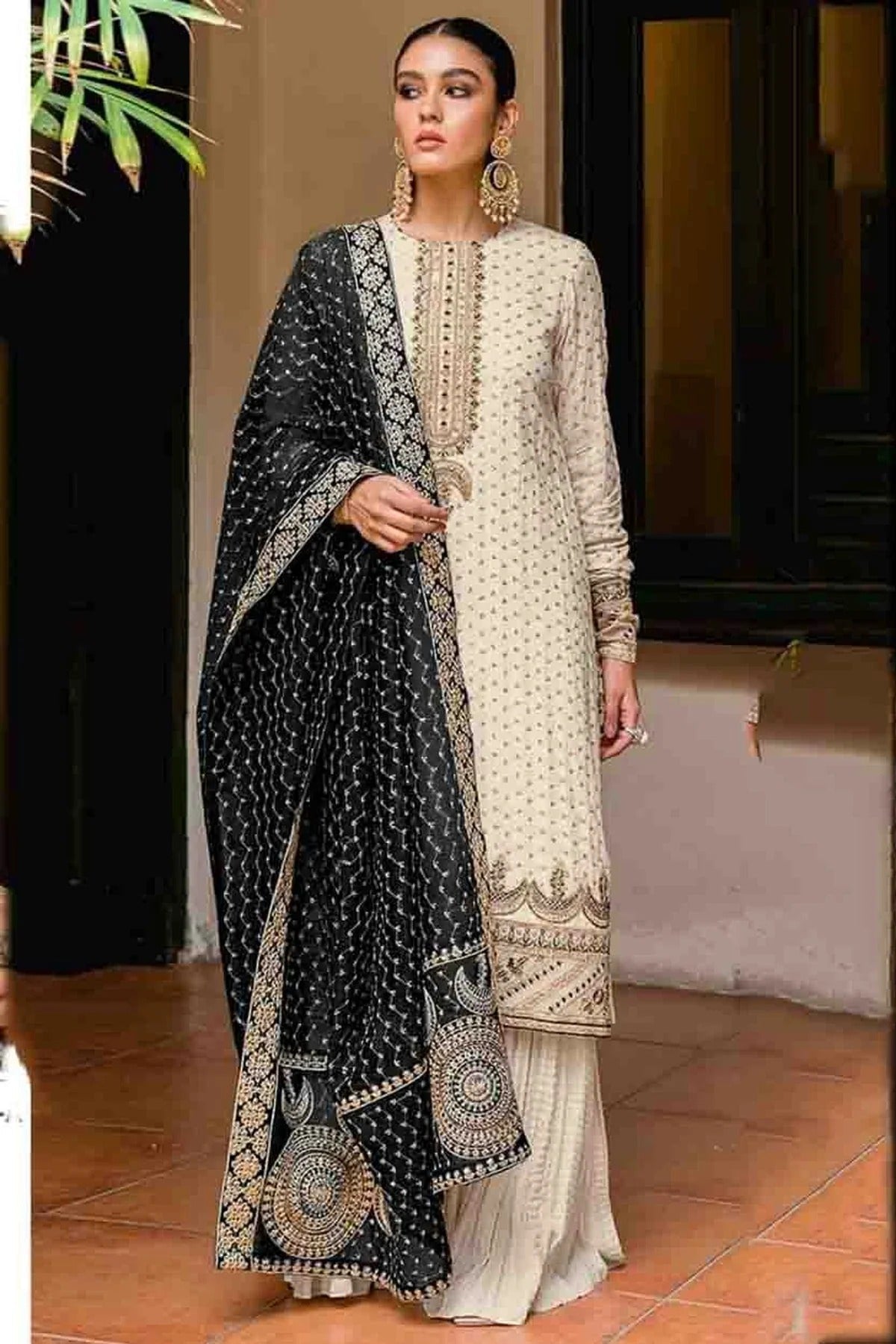Cream Semi Stitched Faux Georgette Palazzo Pant Suit NCSM11410325
