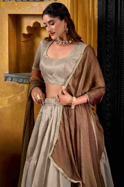 Dhupion Silk Stitched Lehenga Choli In Cream Colour NCLD1300021