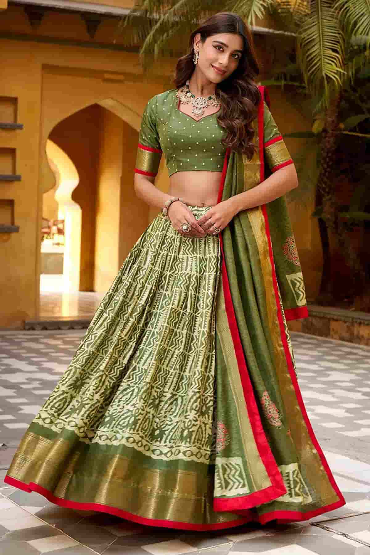 Dola Silk Batik Print Stitched Lehenga Choli In Mehendi Green Colour NCLD1300015