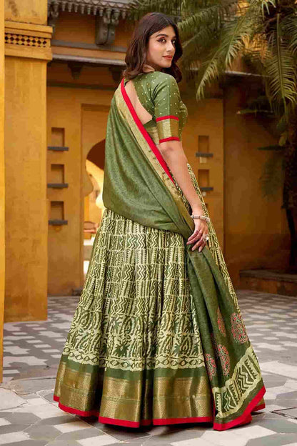 Dola Silk Batik Print Stitched Lehenga Choli In Mehendi Green Colour NCLD1300015