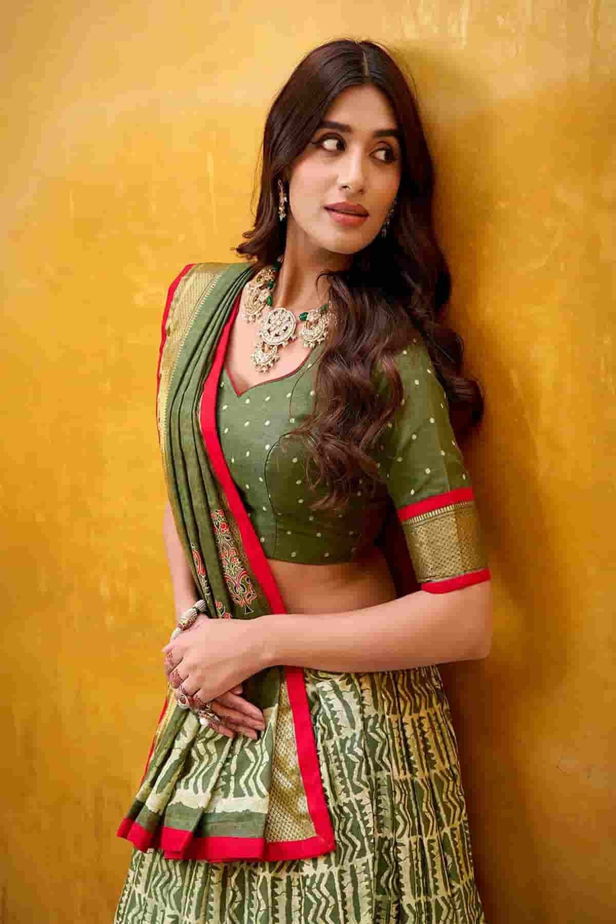 Dola Silk Batik Print Stitched Lehenga Choli In Mehendi Green Colour NCLD1300015