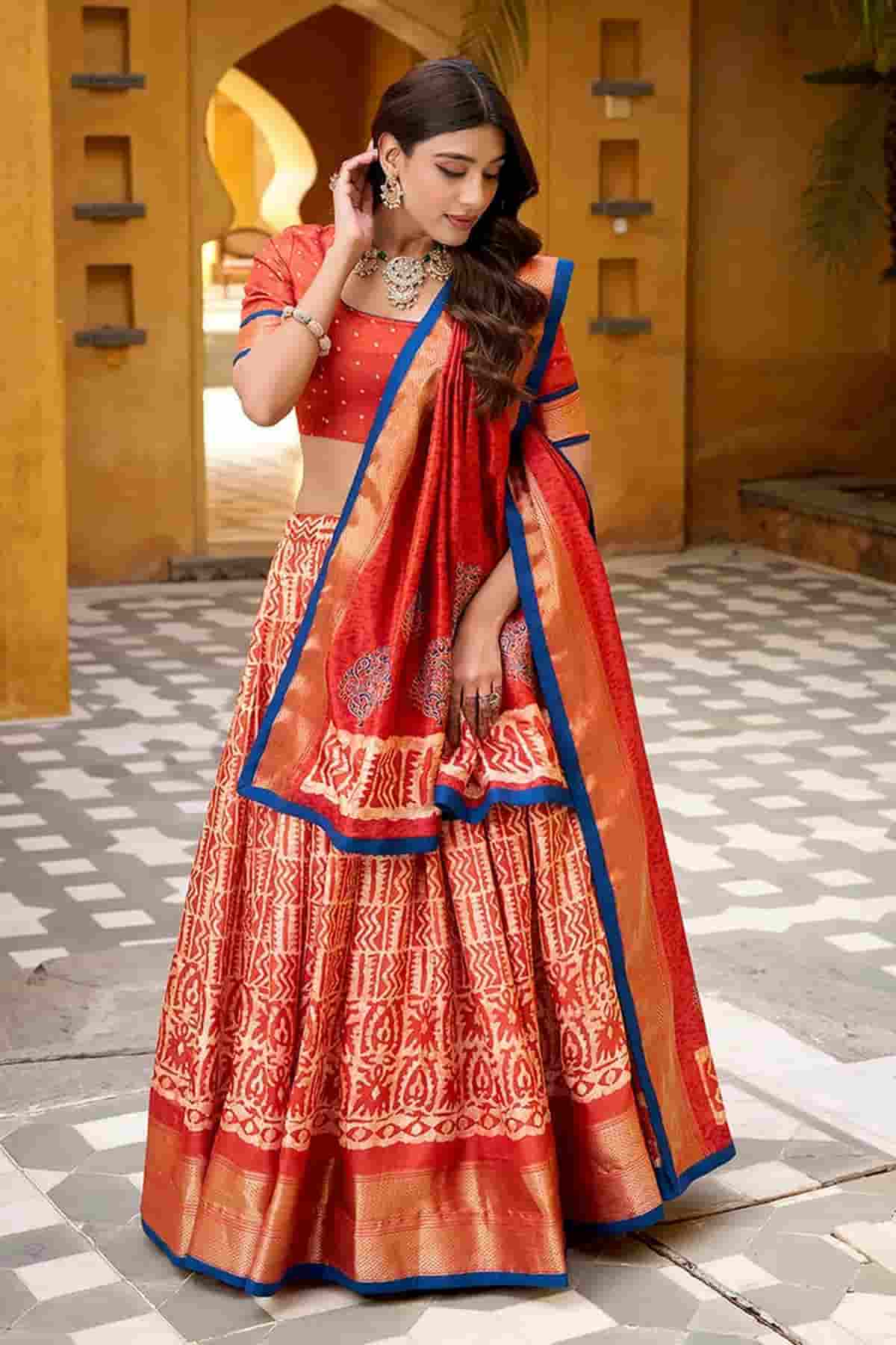 Dola Silk Batik Print Stitched Lehenga Choli In Orange Colour NCLD1300016