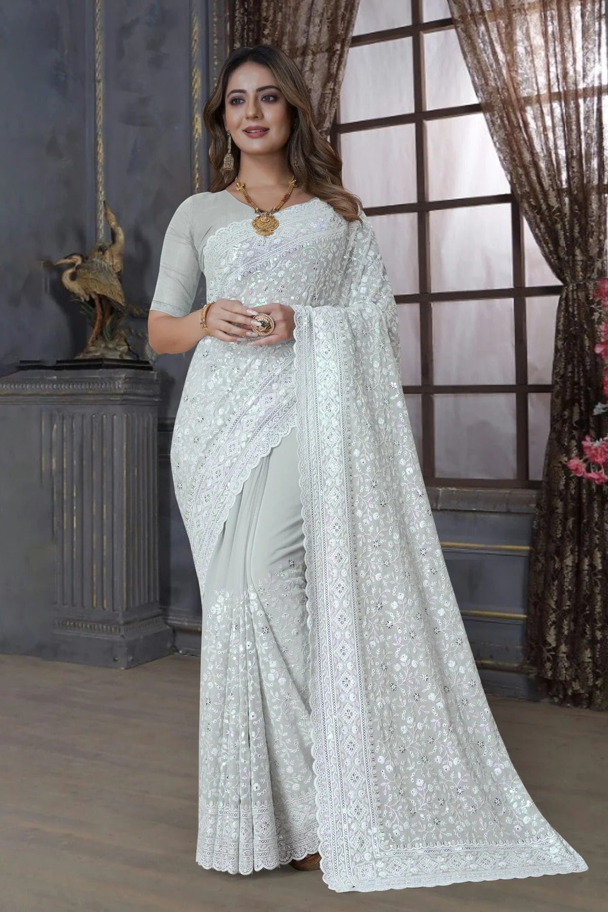 Dusty Pista Green Georgette Saree NCSD10910333